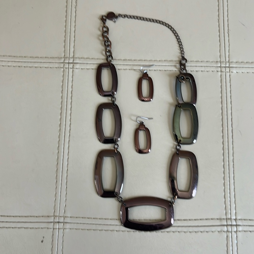 Metallic necklace and earrings set.